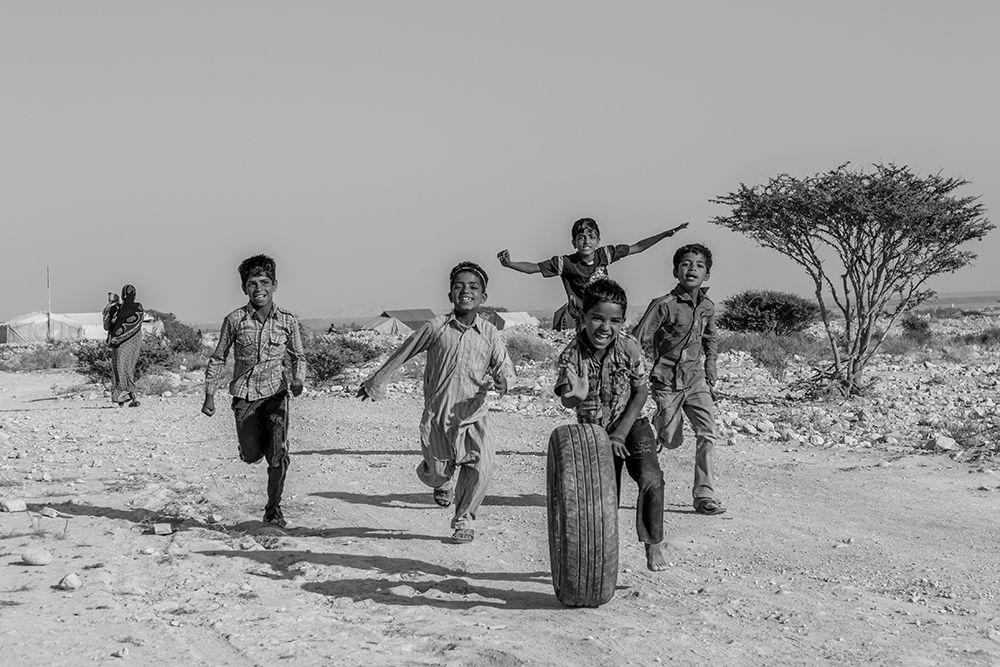 Kids playing art print by Mohammad Shefaa AFIAP for $57.95 CAD