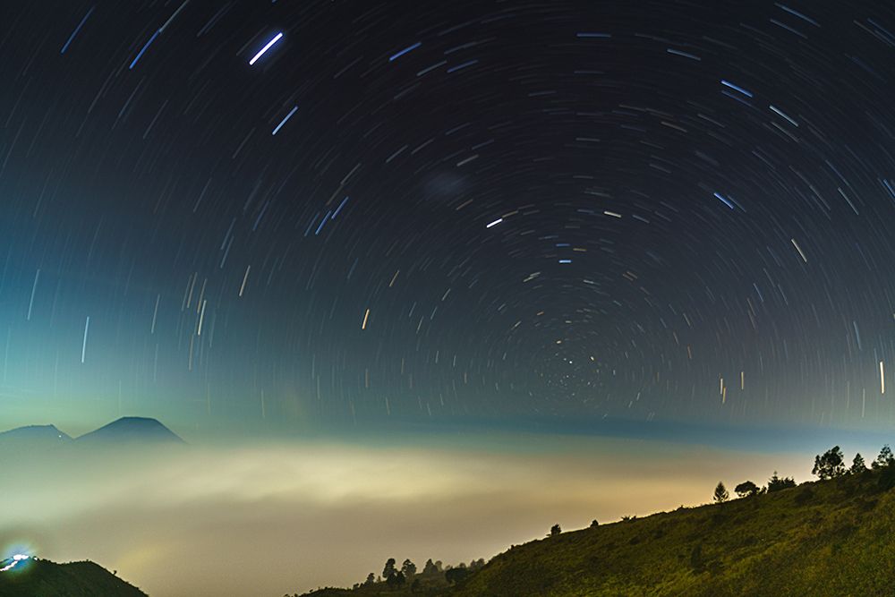 Between Mountains Stars And Fog art print by Evi Soedarsono for $57.95 CAD