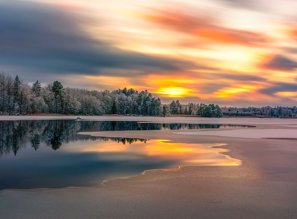 Ice slowly taking over the lake art print by Christian Lindsten for $57.95 CAD