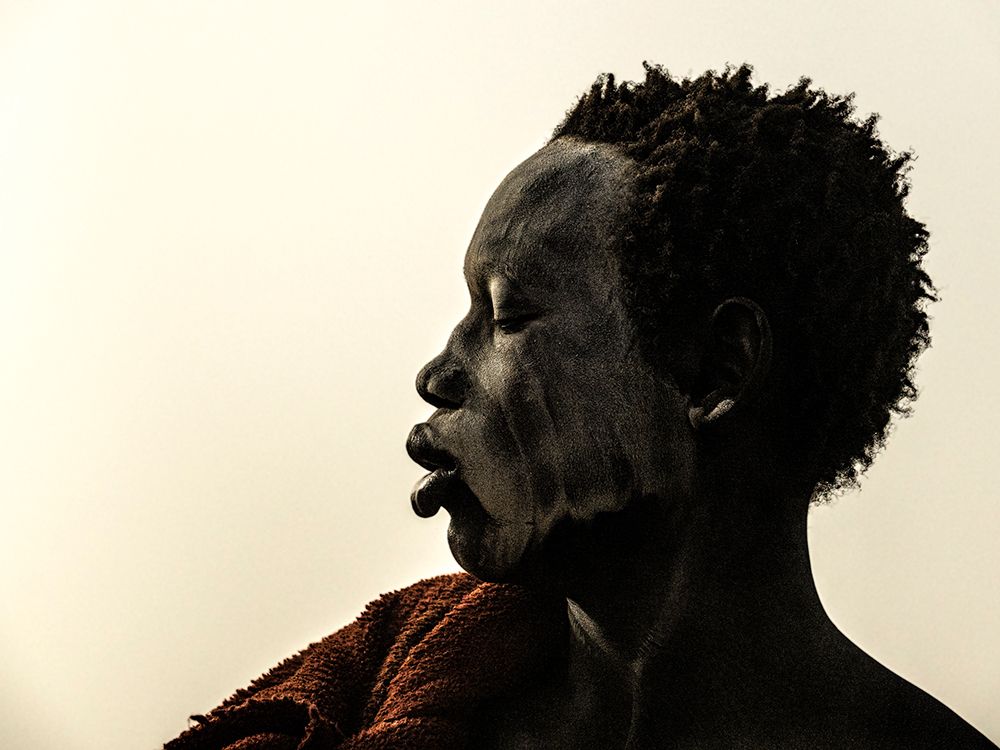 sunset at a mundari camp, South Sudan art print by Elena Molina for $57.95 CAD