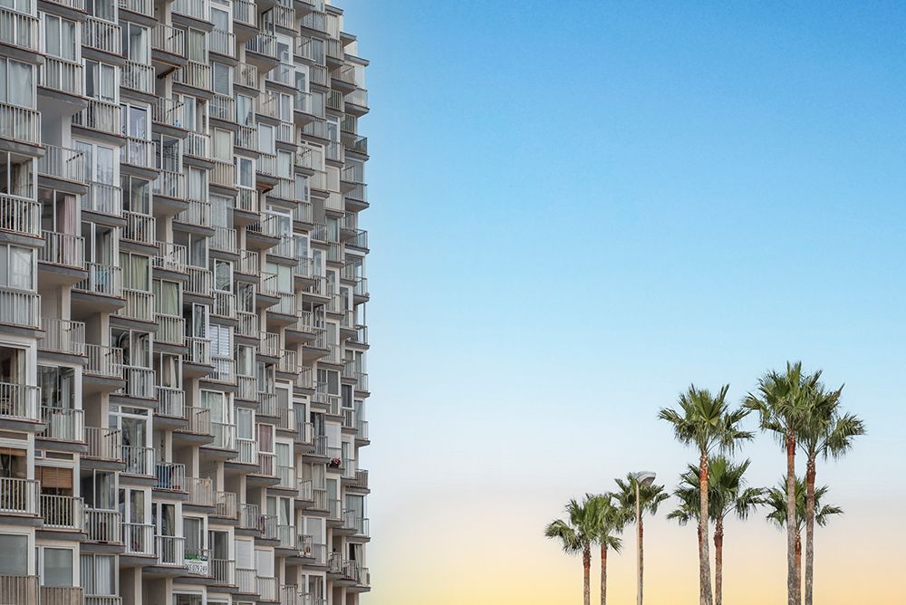 Palms and apartments art print by Linda Wride for $57.95 CAD