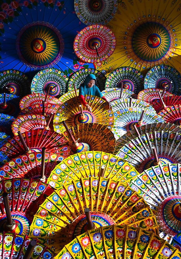 Umbrellas Maker art print by Rawisyah Aditya for $57.95 CAD