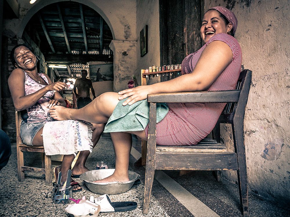 Pedicure In Santiago The Cuba art print by Eyal Alcalay for $57.95 CAD