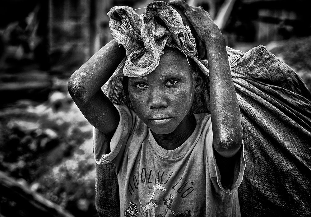 Child Working On Construction In The Streets Of Juba - South Sudan art print by Joxe Inazio Kuesta for $57.95 CAD
