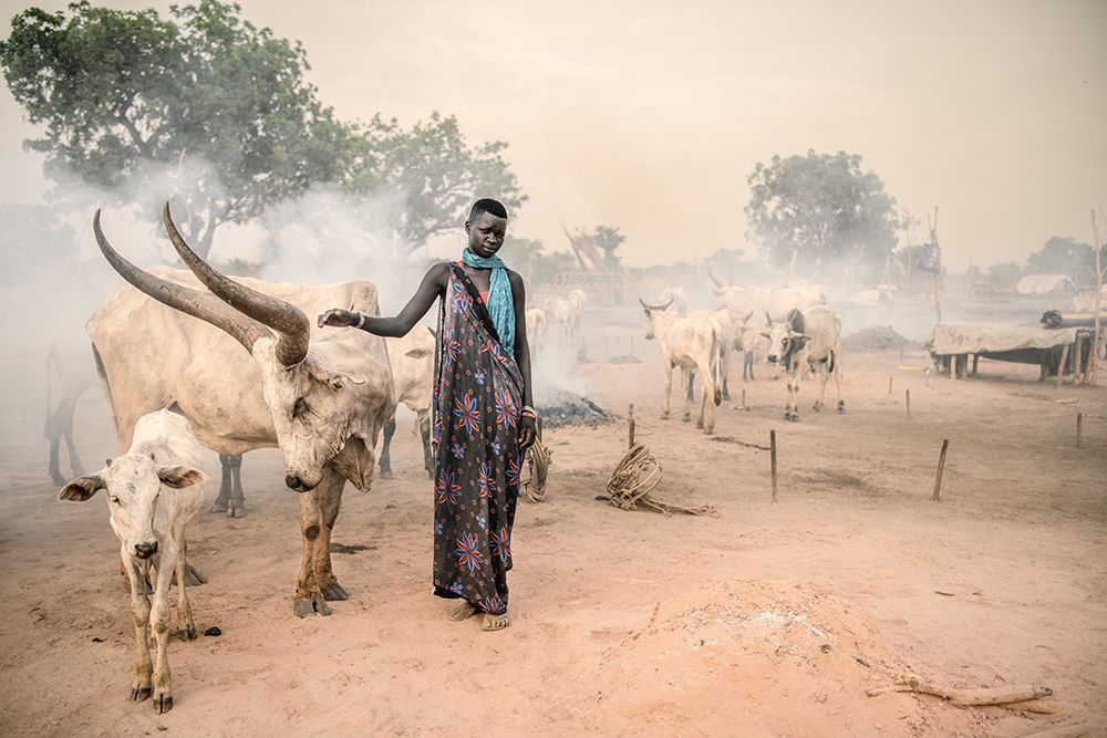 Mundari Woman Herder art print by Trevor Cole for $57.95 CAD
