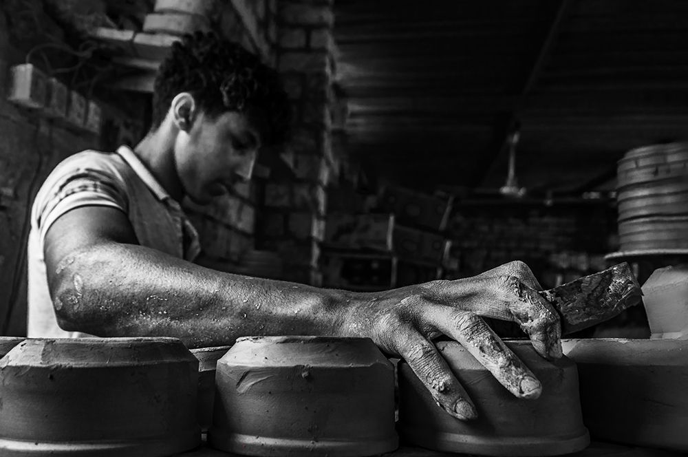 Worker Hand art print by Hesham Ragab for $57.95 CAD
