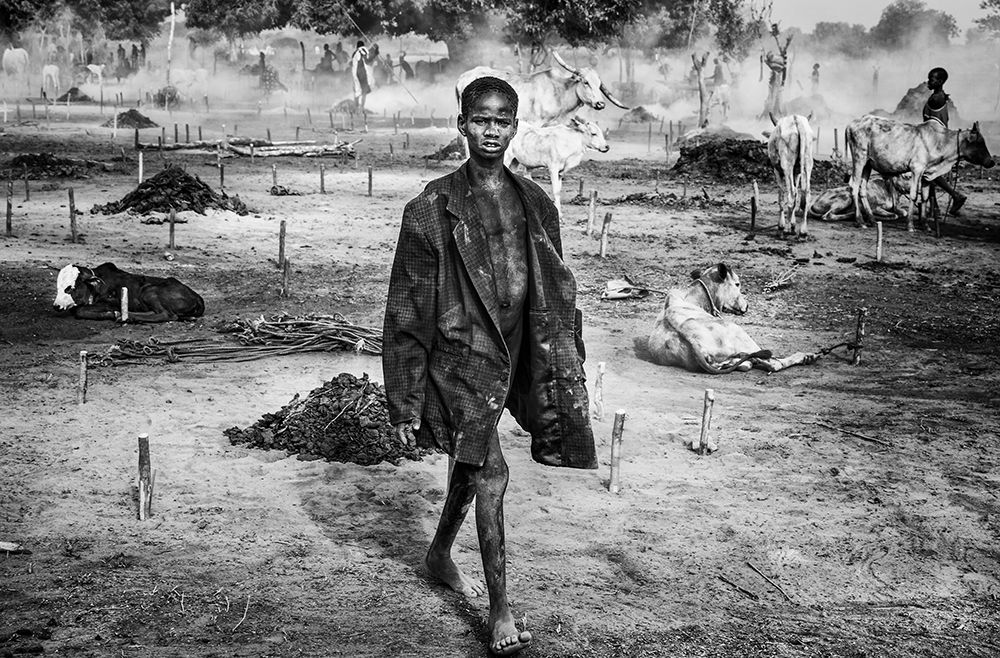 A Scene Of Life In A Mundari Cattle Camp - South Sudan art print by Joxe Inazio Kuesta for $57.95 CAD