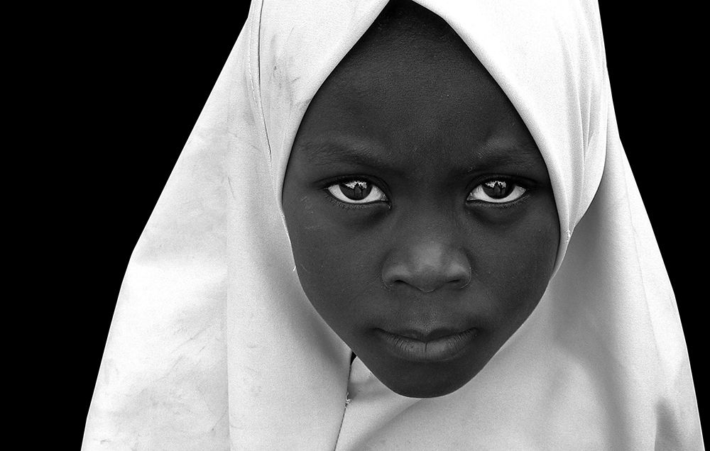 Intense Look Of A Zanzibar Girl art print by Irene Perovich for $57.95 CAD