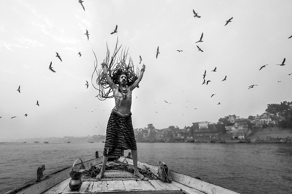 Naga Sadhu Posing On Boat At Varanasi art print by Prithul Das for $57.95 CAD