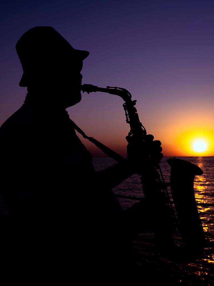 A Musician Playing The Saxophone At Sunset art print by Engin Akyurt for $57.95 CAD