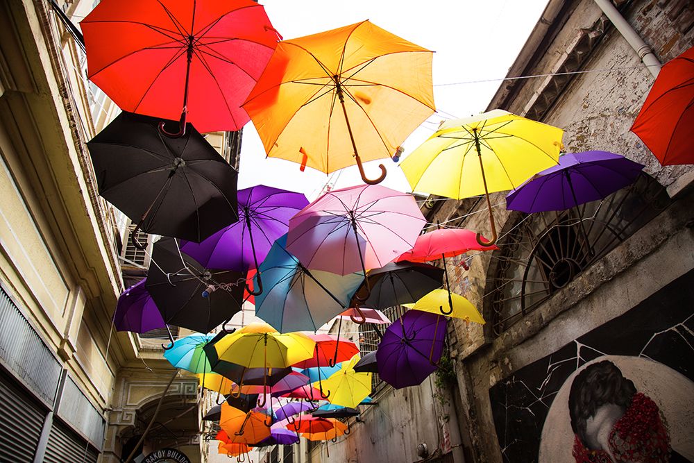 Old Building And Decorative Umbrellas art print by Engin Akyurt for $57.95 CAD