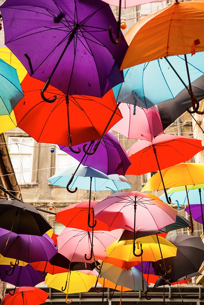Old Building And Decorative Umbrellas art print by Engin Akyurt for $57.95 CAD