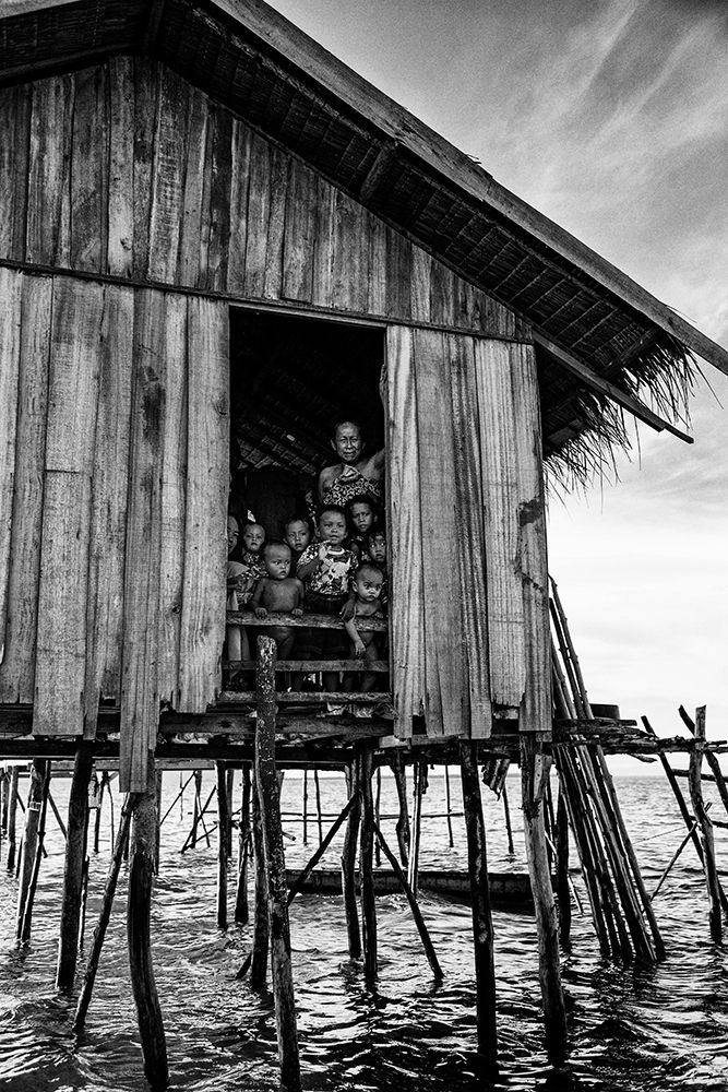 Under The Same Roof- Lifestyles Of The Sea Gipsy Peoples art print by John Yuk Kong for $57.95 CAD
