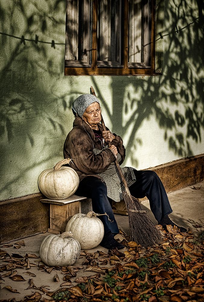 Old woman with pumpkins art print by George for $57.95 CAD
