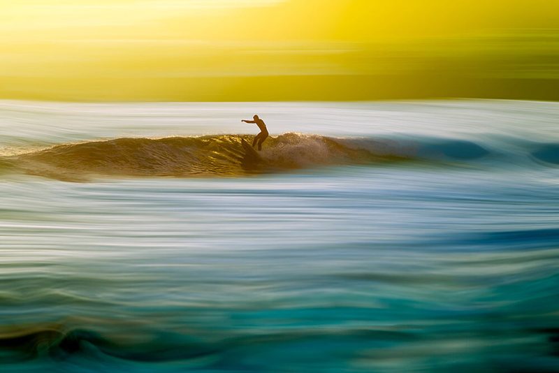 Golden Hour Surfing art print by Paulo Jorge for $57.95 CAD