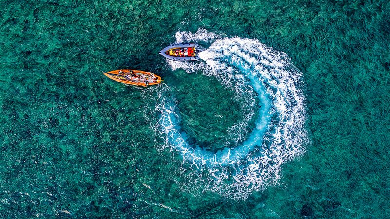 Speedboat Circles Turquoise Sea art print by Ido Meirovich for $57.95 CAD
