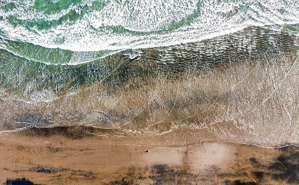 Ocean Waves on Sand art print by Martin Blahak for $57.95 CAD