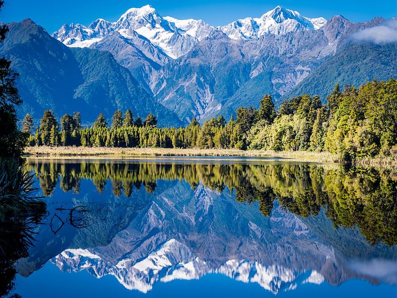 Serene Mountain Lake Reflection art print by Mathieu for $57.95 CAD