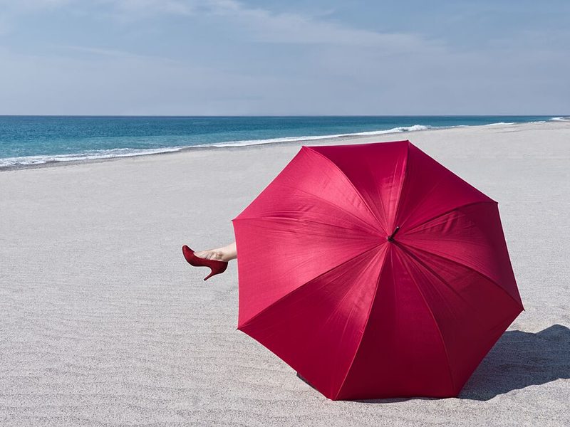 Red Umbrella Beach Escape art print by Karin Kilb for $57.95 CAD