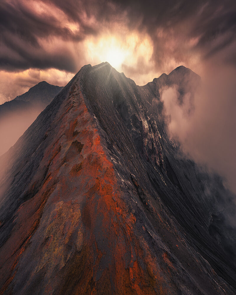 Volcanic Peak Sunburst art print by Bunyamin Wari for $57.95 CAD