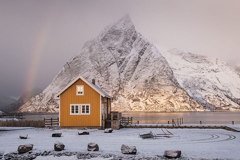 Yellow House Winter Rainbow art print by Dan Mirica for $57.95 CAD