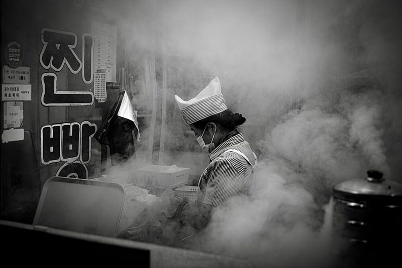 Steamy Korean Street Cook art print by Juik Kim for $57.95 CAD