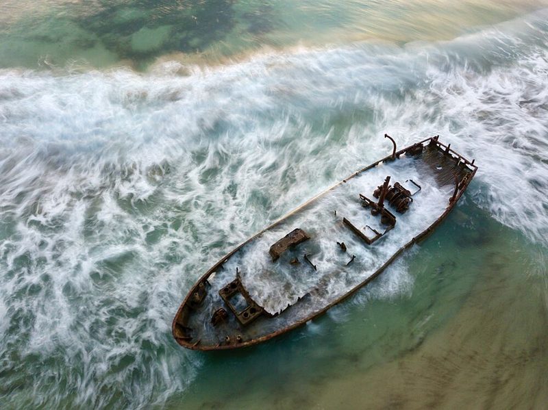 Abandoned Shipwrecked Boat art print by eMunther for $57.95 CAD