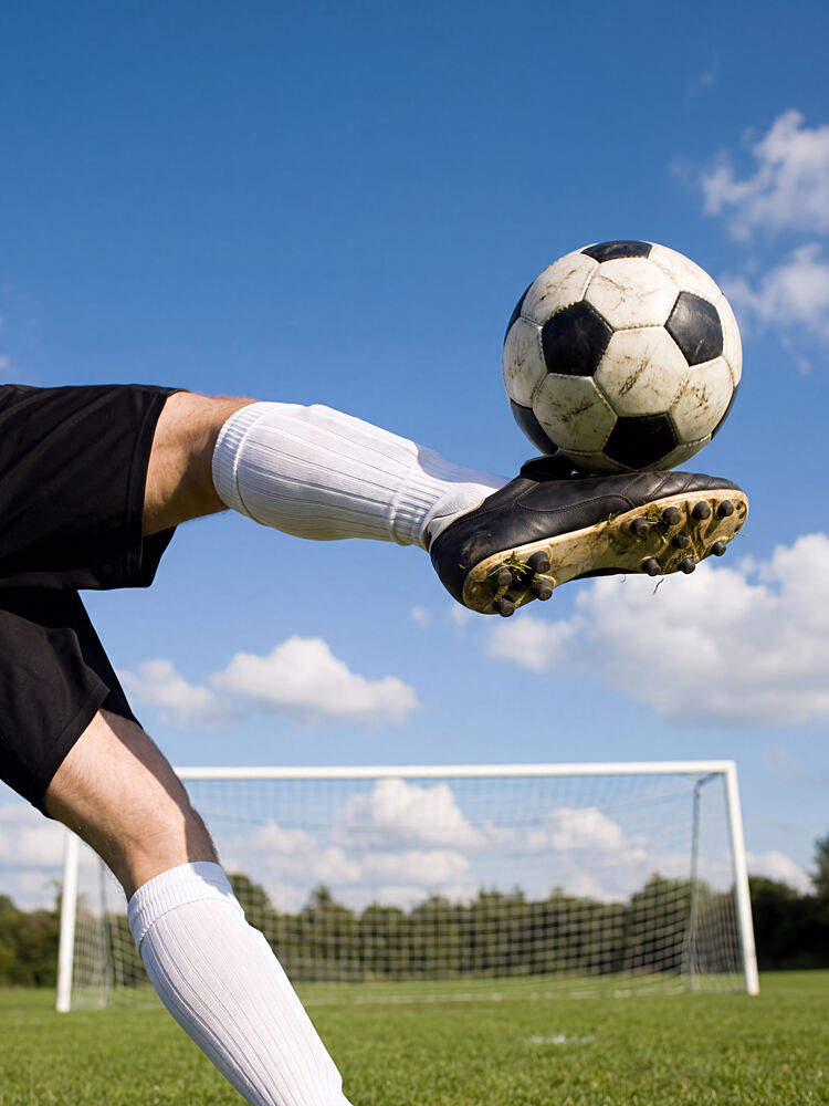 Kicking a Soccer Ball art print by Andreas Magnusson for $57.95 CAD
