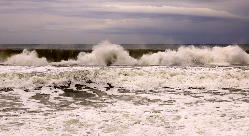 Stunning waves under a cloudy sky in winter art print by Giovanni Saiu for $57.95 CAD