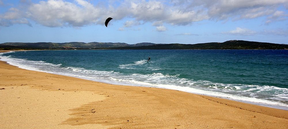Kite Surfing in the blue sardinian sea art print by Giovanni Saiu for $57.95 CAD