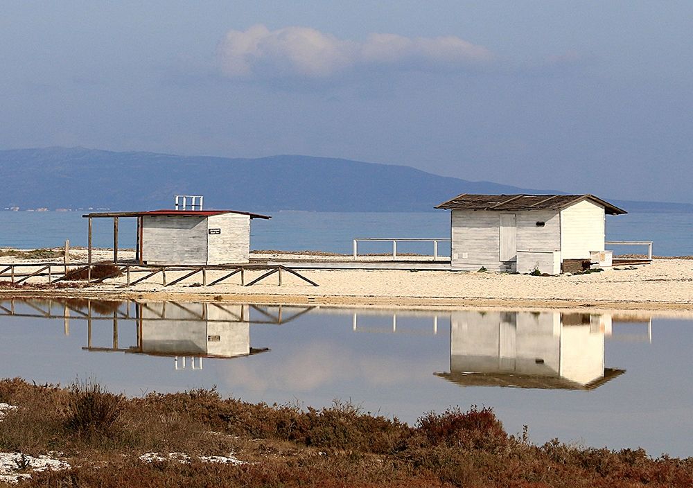 Stintino-sea-salt-flats-wooden-houses-III art print by Giovanni Saiu for $57.95 CAD