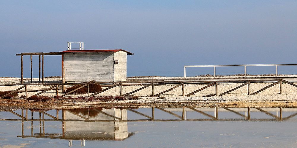 Stintino-sea-salt-flats-wooden-houses-VI art print by Giovanni Saiu for $57.95 CAD