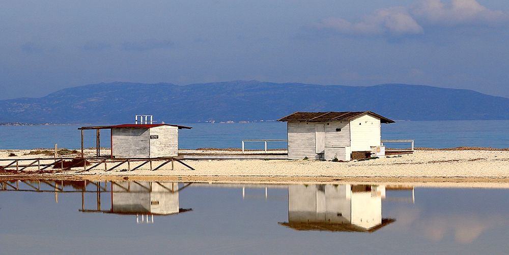 Stintino-sea-salt-flats-wooden-houses-VII art print by Giovanni Saiu for $57.95 CAD