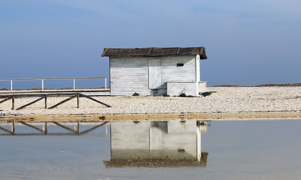 Stintino-sea-salt-flats-wooden-houses-VIII art print by Giovanni Saiu for $57.95 CAD