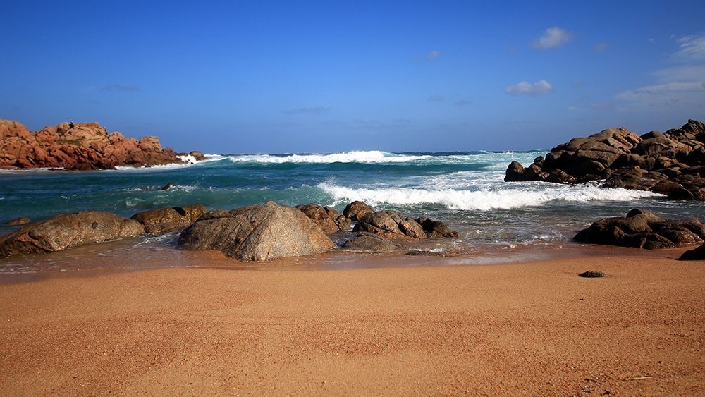 Blue Sea with waves crashing on red rocks art print by Giovanni Saiu for $57.95 CAD