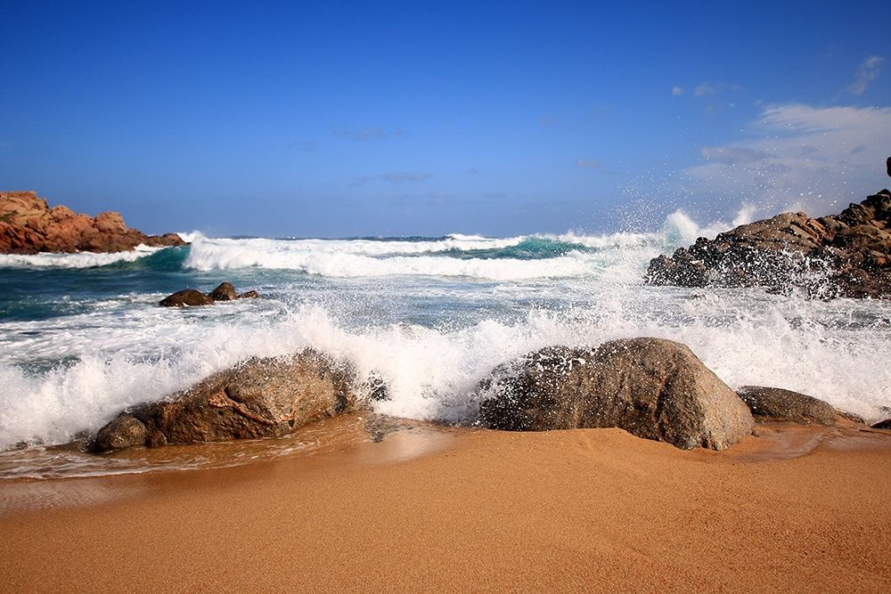 White Sea Foam on red rocks beach art print by Giovanni Saiu for $57.95 CAD