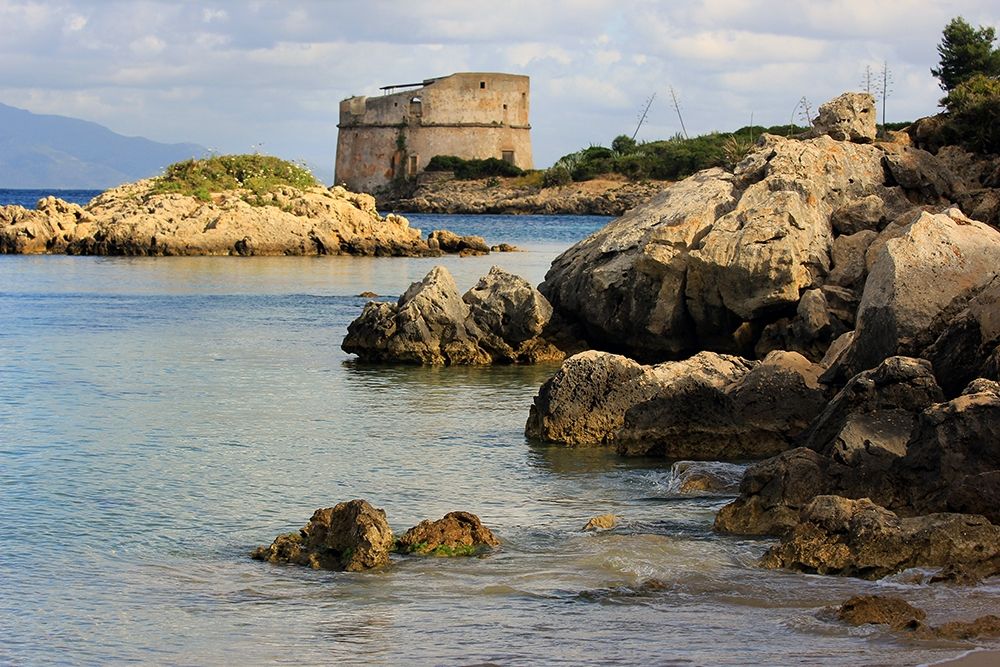 Saracen Tower on crystalline Sea with rocks art print by Giovanni Saiu for $57.95 CAD