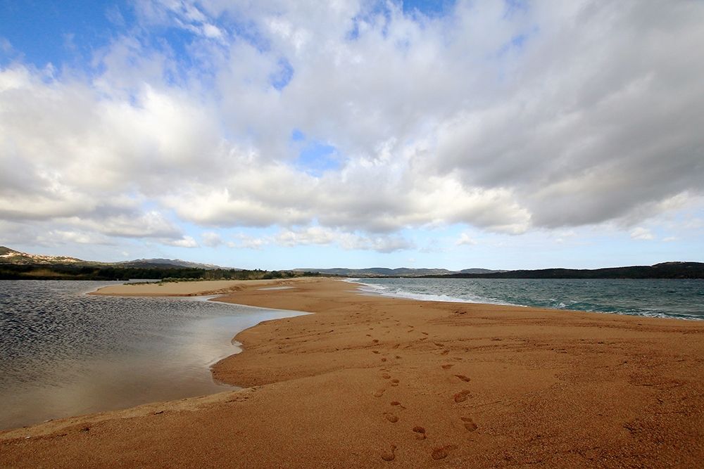 Spit of land in the sea in a cloudy day art print by Giovanni Saiu for $57.95 CAD