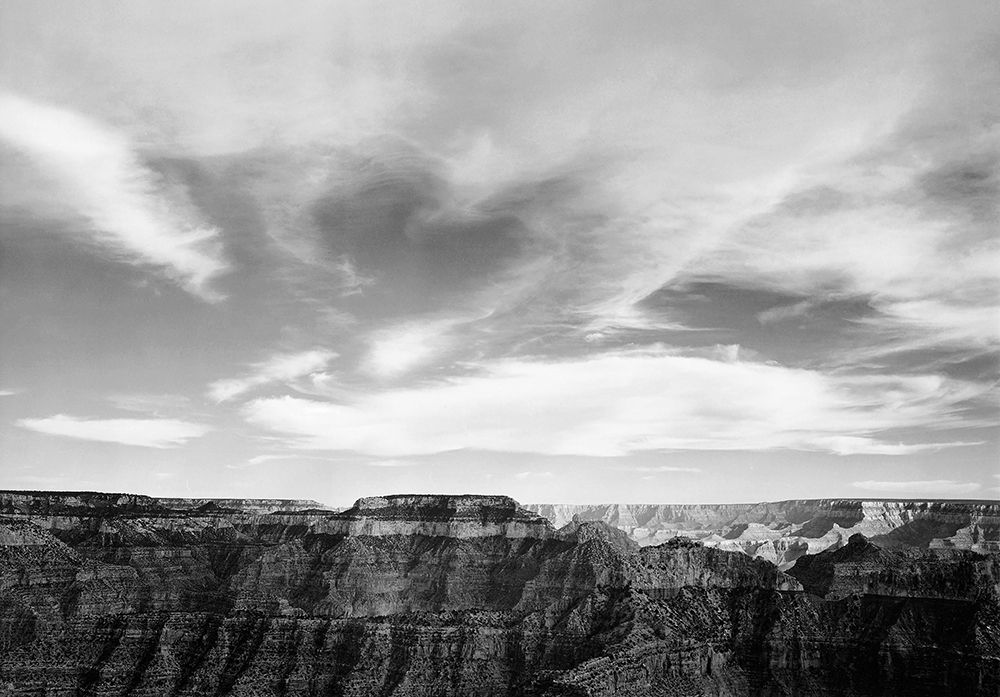 Canyon edge, low horizon, clouded sky, Grand Canyon National Park, Arizona, 1941 art print by Ansel Adams for $57.95 CAD