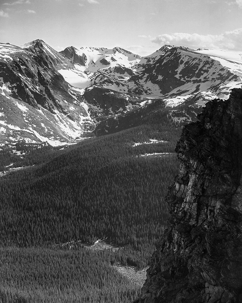 View of snow-capped mountain timbered area below, in Rocky Mountain National Park, Colorado, ca. 194 art print by Ansel Adams for $57.95 CAD