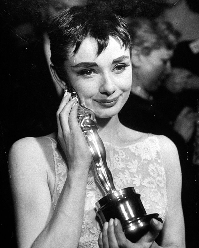 Audrey Hepburn with Oscar won for the romantic comedy film Roman Holiday 1953 art print by Vintage Hollywood Archive for $57.95 CAD