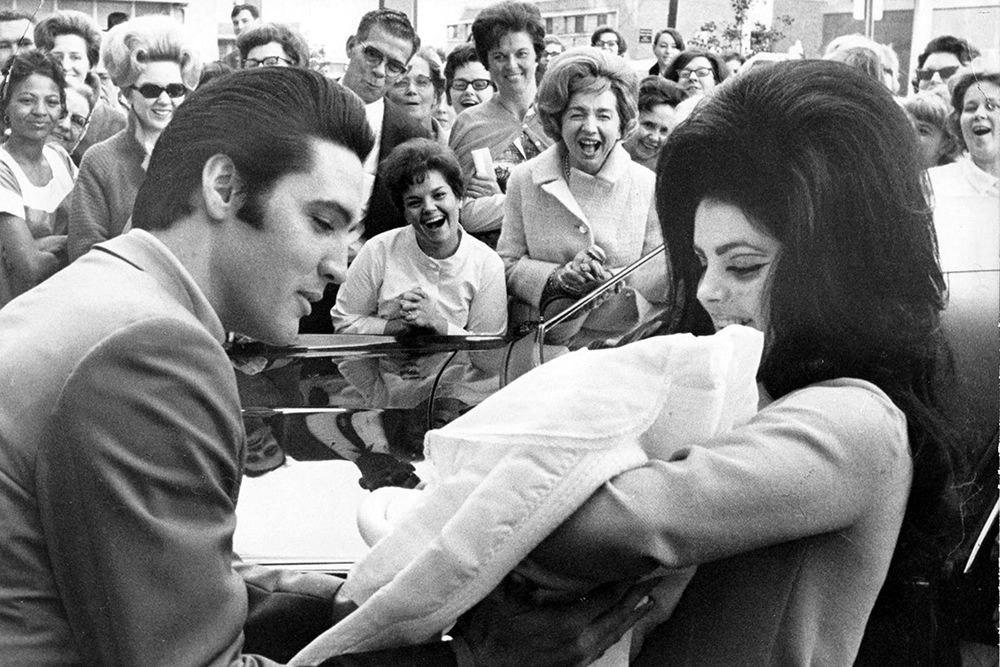Elvis Presley and Priscilla with Lisa Marie-1968 art print by Vintage Music Archive for $57.95 CAD