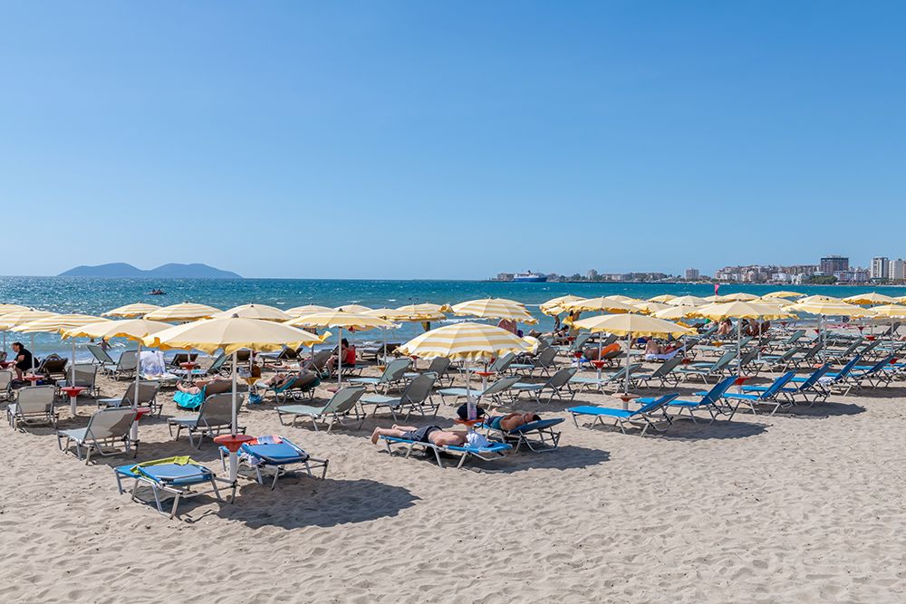 Albanian Beach with Yellow Umbrellas art print by Richard Silver for $57.95 CAD