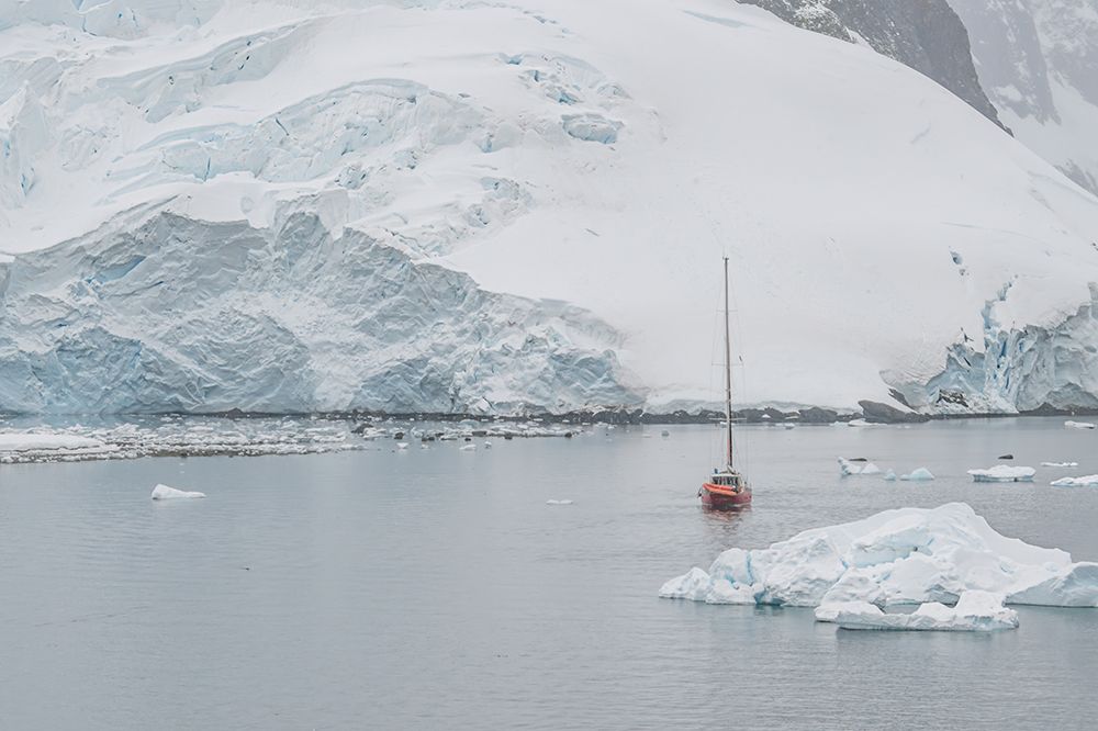 Red Sailboat Near Glacier Wall art print by Richard Silver for $57.95 CAD