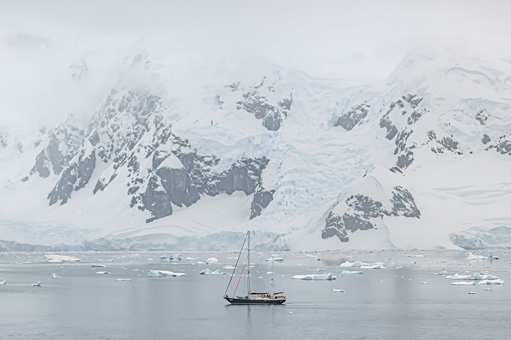 Sailboat Beneath Snowcapped Peaks art print by Richard Silver for $57.95 CAD