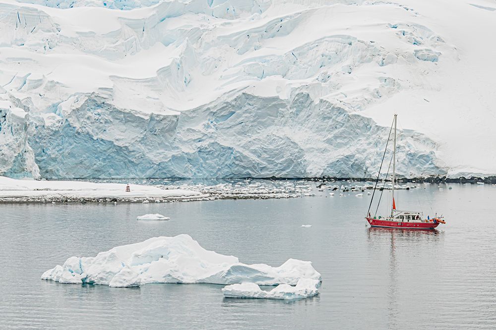 Red Sailboat Against Glacier Face art print by Richard Silver for $57.95 CAD
