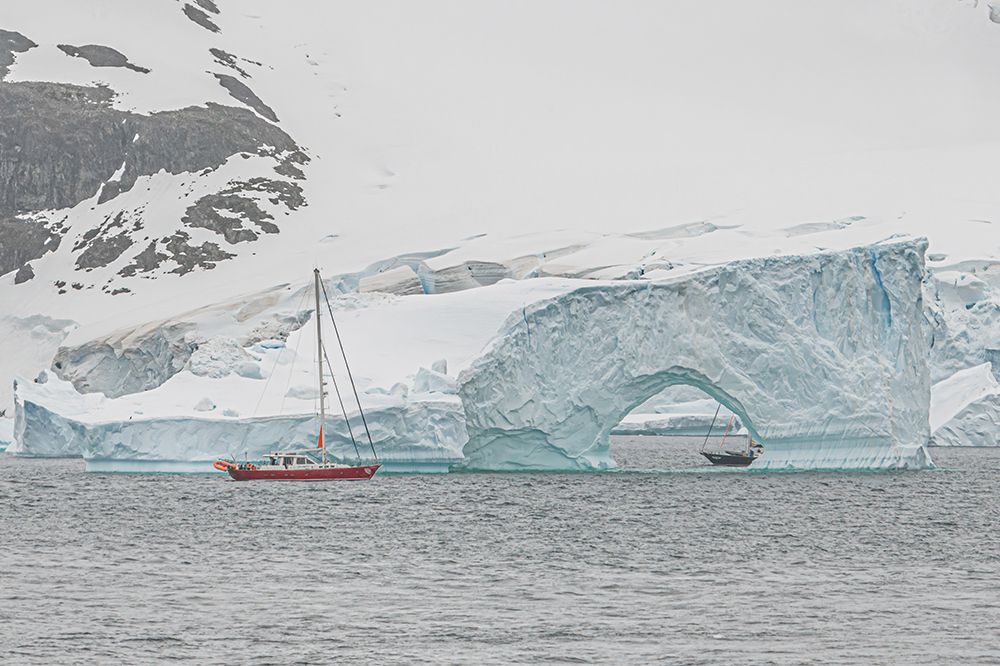 Sailboat Through Iceberg Arch I art print by Richard Silver for $57.95 CAD