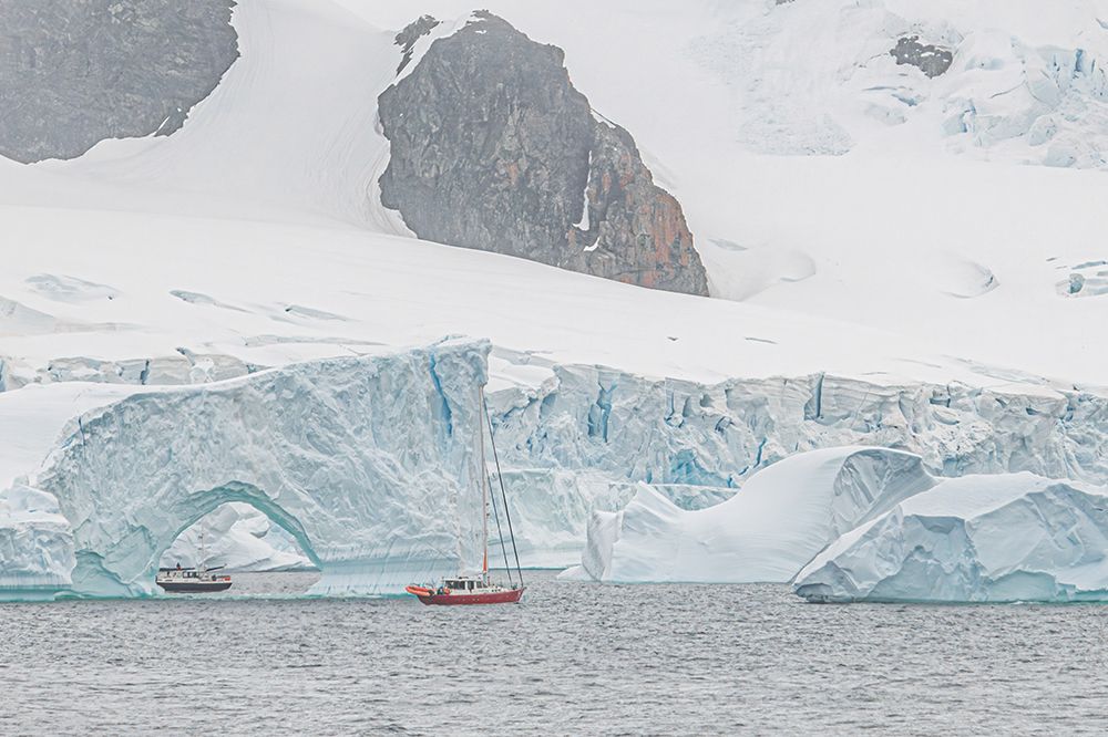 Two Sailboats Near Iceberg Arch art print by Richard Silver for $57.95 CAD
