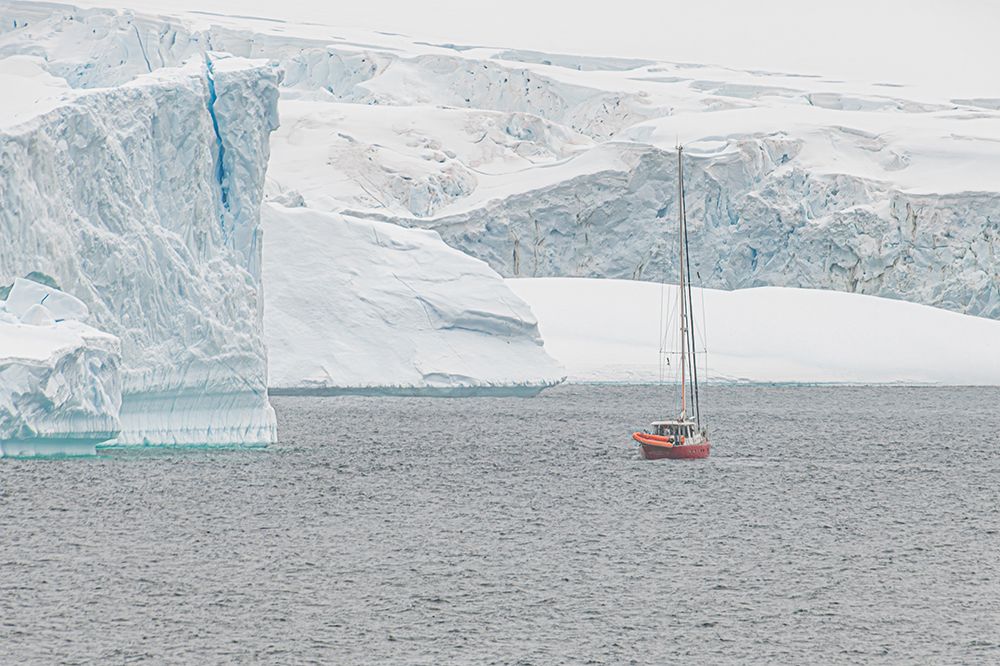 Red Sailboat Blue Iceberg Wall art print by Richard Silver for $57.95 CAD