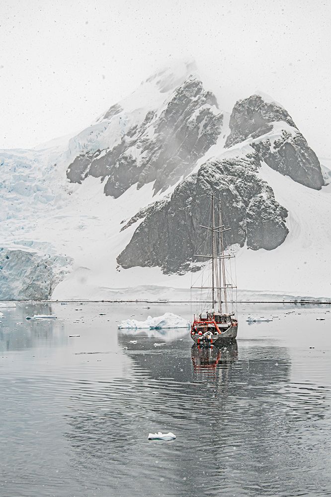 Sailboat Beneath Jagged Peak Vertical art print by Richard Silver for $57.95 CAD